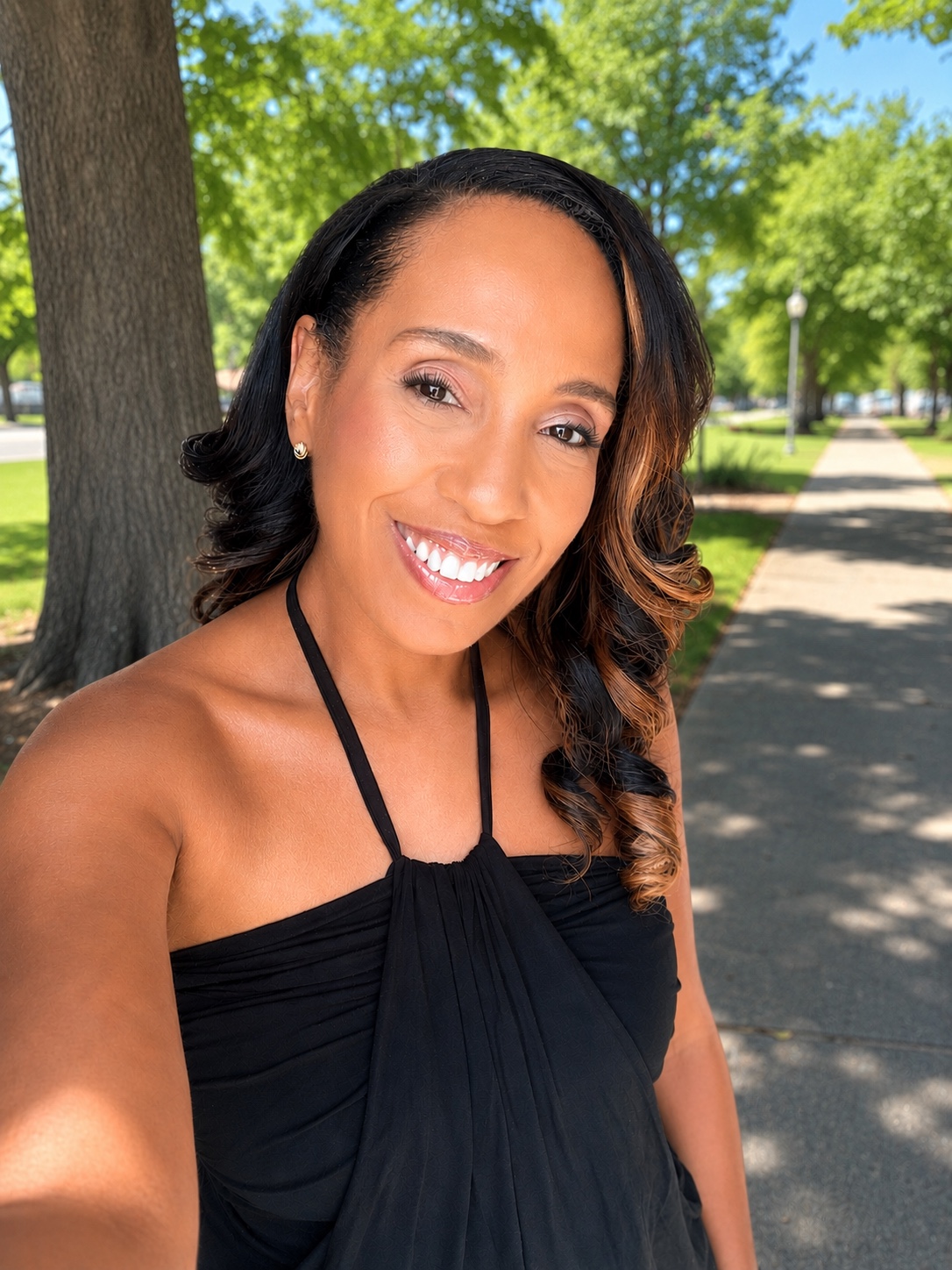 Sherise Holden smiling outdoors